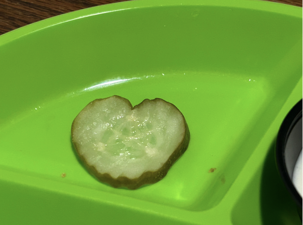 Picture of a heart shaped pickle that I found in my lunch today.
